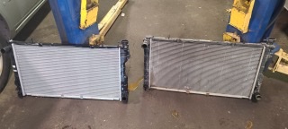 What is the function of a Radiator in a car? 