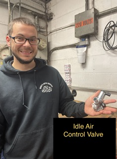 What does the Idle Air Control Valve (IACV) do?